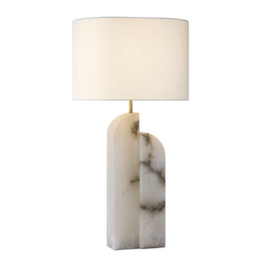 The Savoye Large Right Table Lamp, Alabaster, features a white linen drum shade and a sculpted alabaster base with elegant veining—perfect for elevating contemporary lighting.