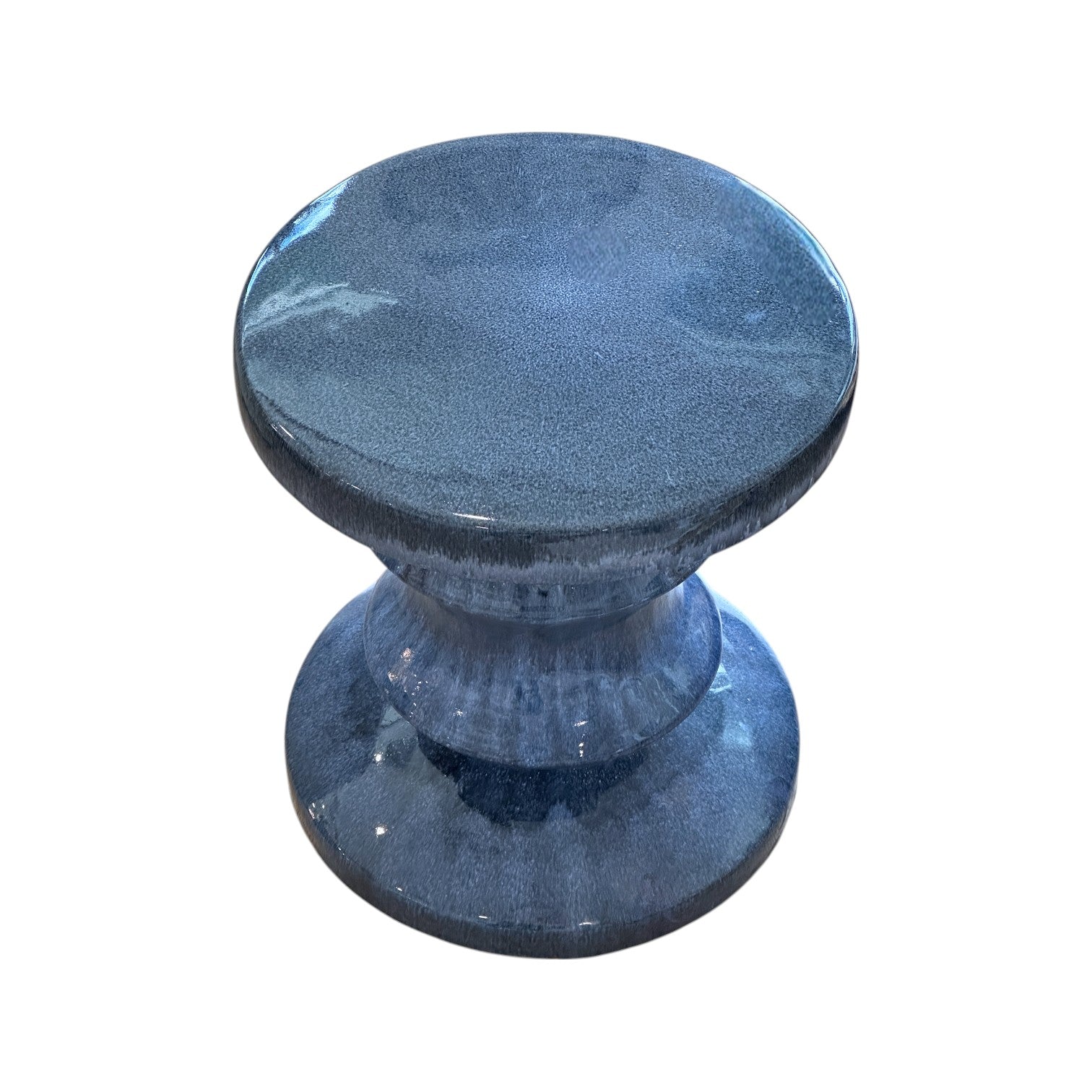 The Feathered Blue Chess Piece Stool features a round, blue-glazed ceramic design with a wide circular top and base, a narrow center section, and is expertly crafted from premium porcelain.