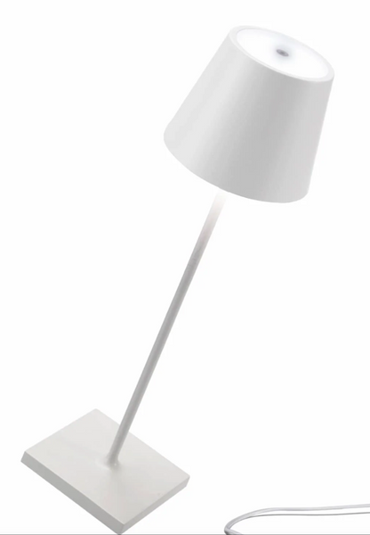 A Zafferano Poldina Pro Cordless Lamp with a cone-shaped shade, a slim stem, and a flat rectangular base. Featuring dimmable LED illumination and equipped with a rechargeable battery for cordless convenience, this lamp blends modern design with functionality.