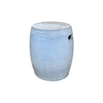 The White Barrel Stool is a fine porcelain garden stool with a barrel shape, horizontal grooves, and a handle hole on one side, shown against a white background.