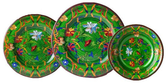 Three plates from the Mario Luca Giusti Pancale Green Collection, showcasing modern shapes and colors, adorned with vibrant floral and abstract patterns.