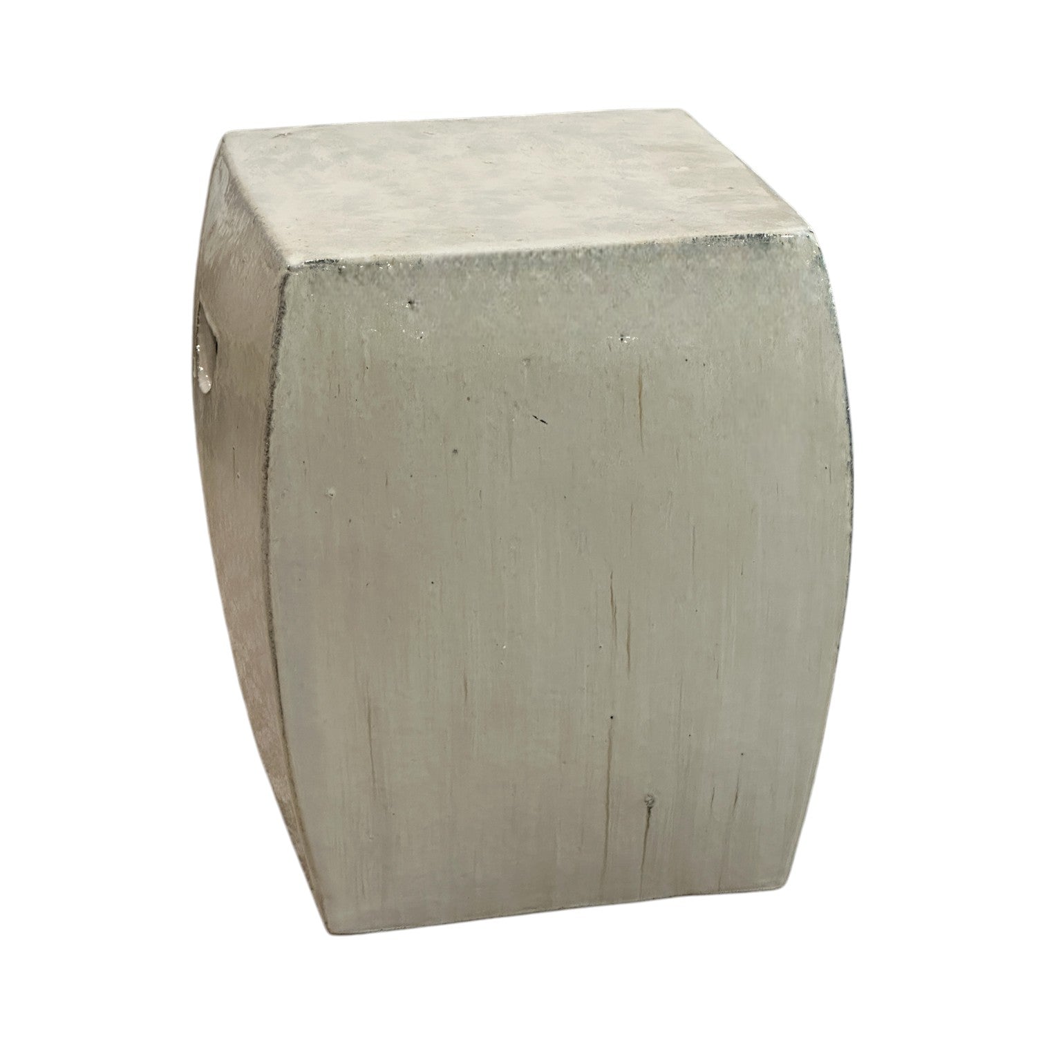 The Solid Square Stool in White is a metallic, rectangular stool with gently curved sides and a matte finish, offering an antique look inspired by handcrafted rustic designs.