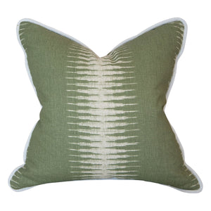 The Ikat Olive Pillow is a square green throw pillow featuring a white linear gradient center pattern and white piping, crafted from premium materials for a luxurious feel.