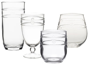 Introducing the Juliska Isabella Acrylic Collection: a set of five clear, Bohemian-style drinking glasses, each with unique sizes and shapes. These glasses feature decorative embossed lines and raised dots, making them ideal for the adventurous entertainer seeking to infuse their gatherings with artful elegance.