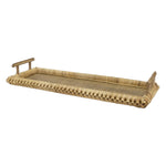 The Kenis Braided Rectangle Tray is a hand-woven rattan tray featuring raised handles on each end and a textured edge detail.
