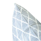 Close-up of the Raj Outdoor Lumbar Pillow, featuring a sun-resistant fabric with a light blue and white geometric pattern, set against a plain white background.