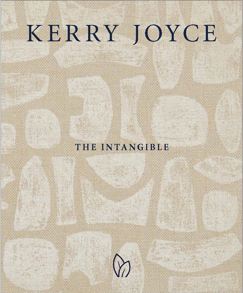 Book cover of *Kerry Joyce: The Intangible*, showcasing abstract beige textured shapes against a light background, embodying refined elegance. The author's and title’s names stand out in dark blue text, completed with a small leaf symbol at the bottom.