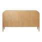 The Pierre Dresser in Pristine Shagreen and Washed Oak features a rectangular back view, rounded corners, and tapered legs. Its whitewashed oak finish highlights a light, natural wood grain for timeless elegance.