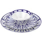 Three dishes from the Themis Z Kyma Blue Collection—bowl, salad plate, and dinner plate—are stacked, featuring white ceramic with blue abstract lines inspired by the Greek Aegean Sea.