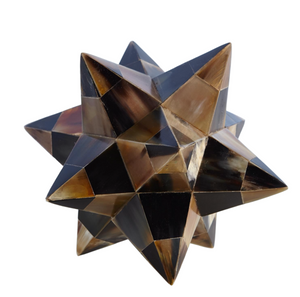 A geometric star-shaped sculpture made of interlocking pyramids in various shades of brown and black, resembling a Stellated Dodecahedron, Brown Horn, with some pieces crafted from MDF substrate and accented with horn veneer.