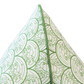 Close-up of the pointed corner of the Wave Grass Pillow, showcasing its green and white circular patterned design against a white background. This custom pillow includes a hidden zipper closure for a seamless look.