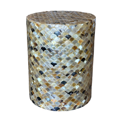 The Horn Scallop Stool features a cylindrical form with iridescent tiles in gold, brown, and cream that resemble fish scales—ideal for adding contemporary style and functional seating to any space.