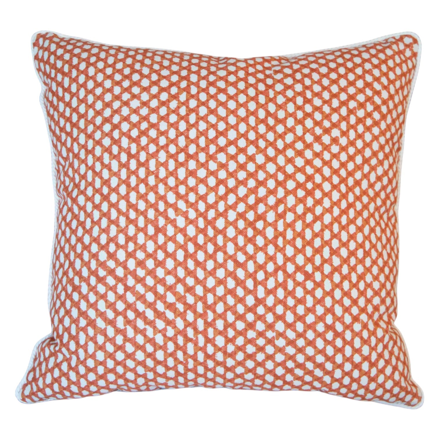 The Mandarin Wicker Outdoor Pillow features an orange and white geometric dot pattern, crafted from premium materials for a luxurious feel. Shown on a plain white background.