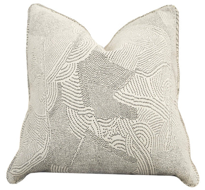 A Maralinga Ombre Pillow with a textured, abstract black and white dotted pattern, crafted from the finest materials.