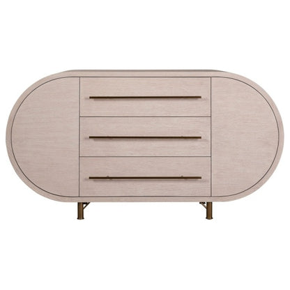 The Mullinex Low Cabinet features an oval shape in white rustic pine, three central drawers with long horizontal handles, four short metal legs, and ample storage for your essentials.