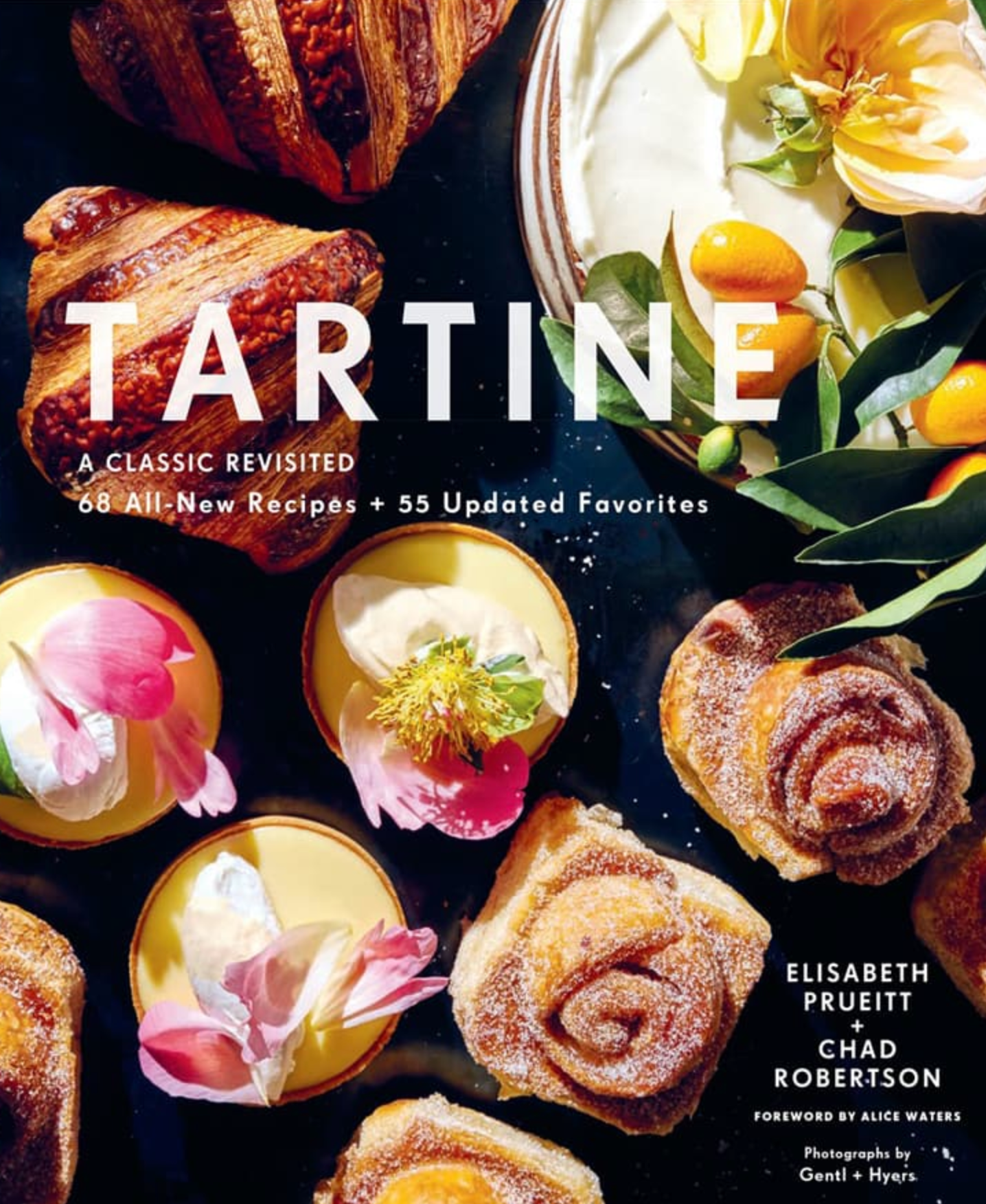 Cover of the baking book **"Tartine: A Classic Revisited"** featuring various pastries and a cake. The authors, Elisabeth Prueitt and Chad Robertson, include notes of “68 All-New Recipes + 55 Updated Favorites,” with gluten-free variations highlighted.