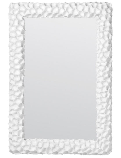 A Dara Coral Mirror, White with a textured, rock-like frame offers a coral-inspired aesthetic.