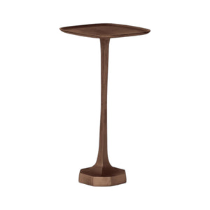 The Brenna Drinks Table is a compact bronze table with a slender stem, hexagonal base, and gently curved square tray top.