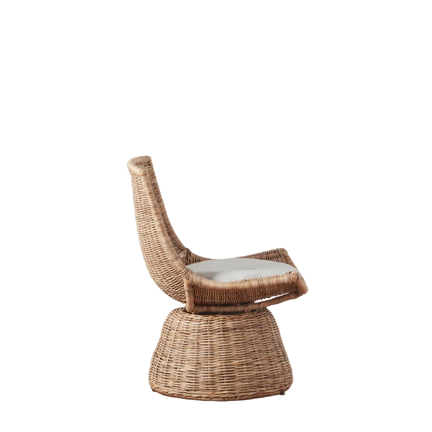 Side view of the Healdsburg Small Wicker Swivel Chair, handwoven with rattan and featuring a curved backrest, white seat cushion, and a wide rounded base for compact and comfortable seating.