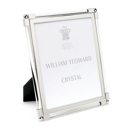 Classic clear photo frame with a tarnish-resistant placeholder insert featuring the text "William Yeoward Crystal Classic Clear Frame Collection.