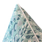 Close-up of the Cowrie Shell Aqua Outdoor Pillow, showcasing its blue and white abstract leaf design and crisp white piping, crafted with care and displayed against a clean white background.