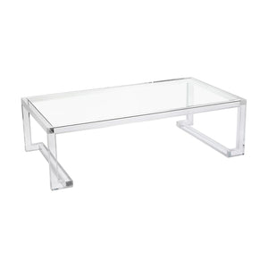The Ava Cocktail Table features a clear acrylic rectangular design with open rectangular legs and minimalist, modern styling—bringing contemporary elegance to any space.