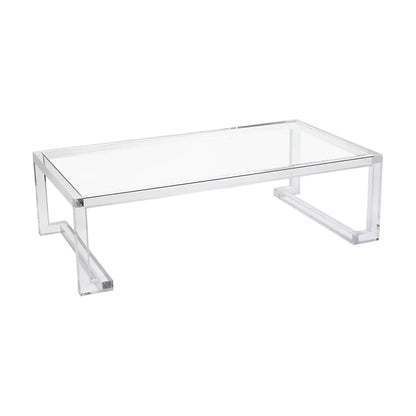 The Ava Cocktail Table features a clear acrylic rectangular design with open rectangular legs and minimalist, modern styling—bringing contemporary elegance to any space.