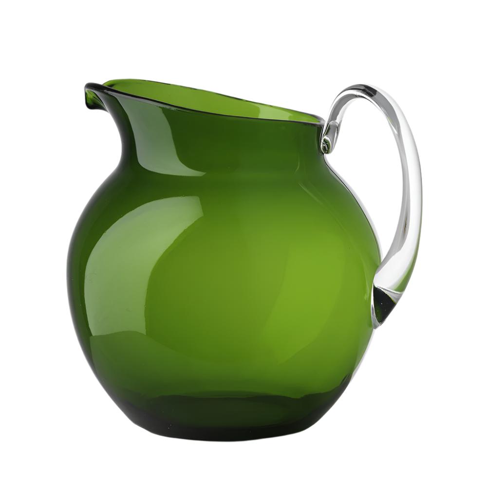 A pitcher from the Mario Luca Giusti Acrylic Palla Pitcher Collection, featuring a green glass design with a clear handle, displays its refreshing new shapes with a round body and wide spout, set against a plain white background.