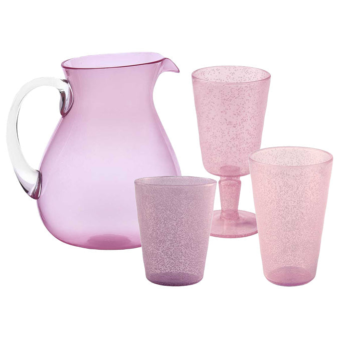 Part of the Memento Acrylic Pink Collection, this purple pitcher with a clear handle is ideal for outdoor dining. It includes three durable acrylic glasses, one of which is an elegant stemmed option.