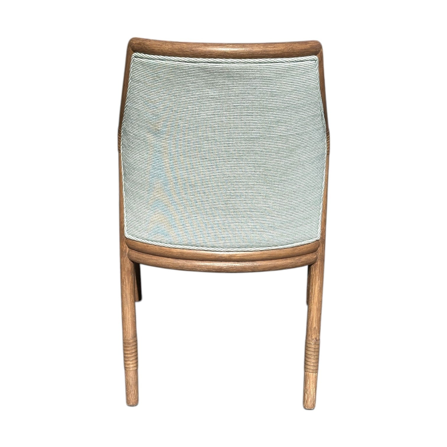 The Lantana Side Chair is shown from the back, displaying its light custom fabric on the backrest and wooden legs, set against a white background.