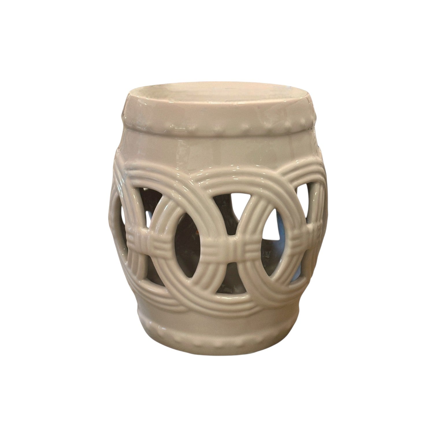 Flush Pink Fine Porcelain Circle Stool, crafted from fine porcelain with an openwork circular design and glossy finish, shown against a plain white background.