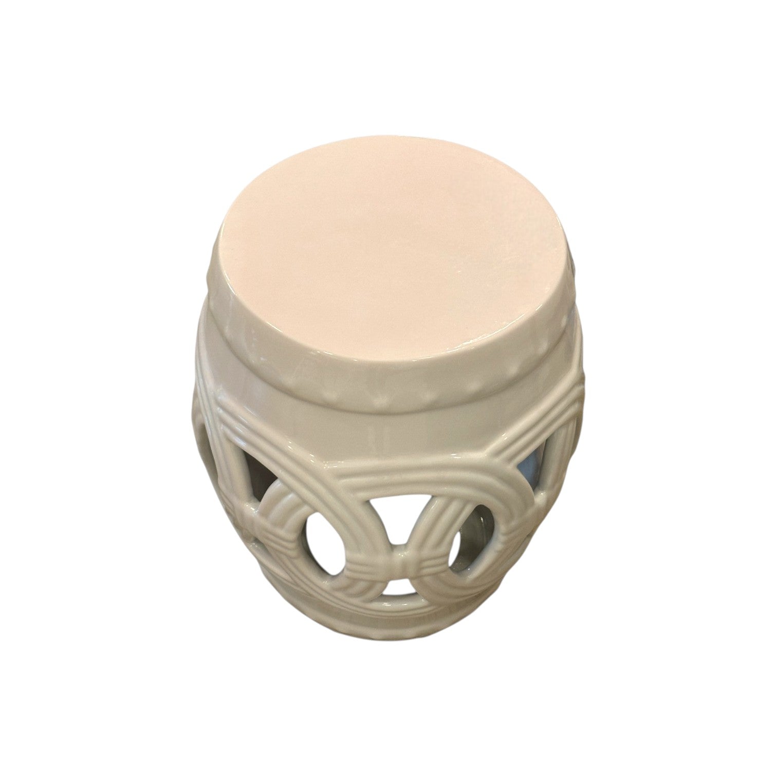 Flush Pink Fine Porcelain Circle Stool featuring an openwork circular pattern and a smooth, flat top, crafted from quality porcelain and showcased against a plain white background.