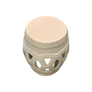 Flush Pink Fine Porcelain Circle Stool featuring an openwork circular pattern and a smooth, flat top, crafted from quality porcelain and showcased against a plain white background.