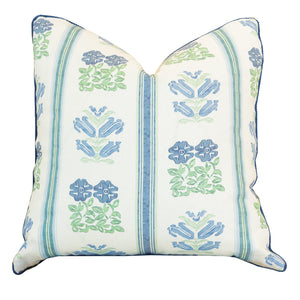 The Folk Floral Pillow is a square throw pillow with a white background, featuring blue and green floral and stripe patterns. This custom pillow is finished with a hidden zipper closure for a sleek look.