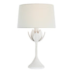 The Alberto Cordless Lamp in Plaster White features a sculpted, flower petal-inspired base and an elegant linen shade.
