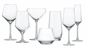 A collection of seven assorted clear Fortessa Pure Collection wine glasses, including red and white wine glasses, champagne flutes, and a short tumbler made from Pure Tritan Crystal, arranged against a plain white background.