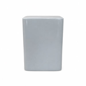 A matte light blue fiberstone square stool with rounded edges, perfect as modern seating or a pedestal accent, is shown against a plain white background.