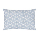 Raj Outdoor Lumbar Pillow with a blue and white geometric diamond pattern on sun-resistant fabric, viewed from above against a plain white background.