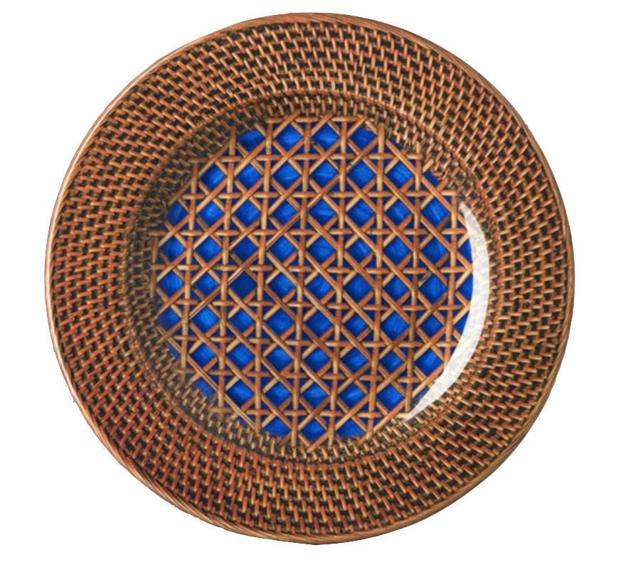 The Mario Luca Giusti Patagonia Blue Collection features a decorative plate adorned with a woven brown pattern on the rim and a blue geometric lattice design in the center, seamlessly blending modern aesthetics with timeless charm.