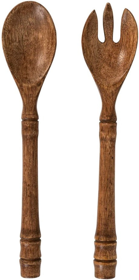 Wooden salad serving set featuring a spoon and a fork with rustic finishes, crafted from mango wood. Part of the Juliska Bilbao Wood Serving Collection.