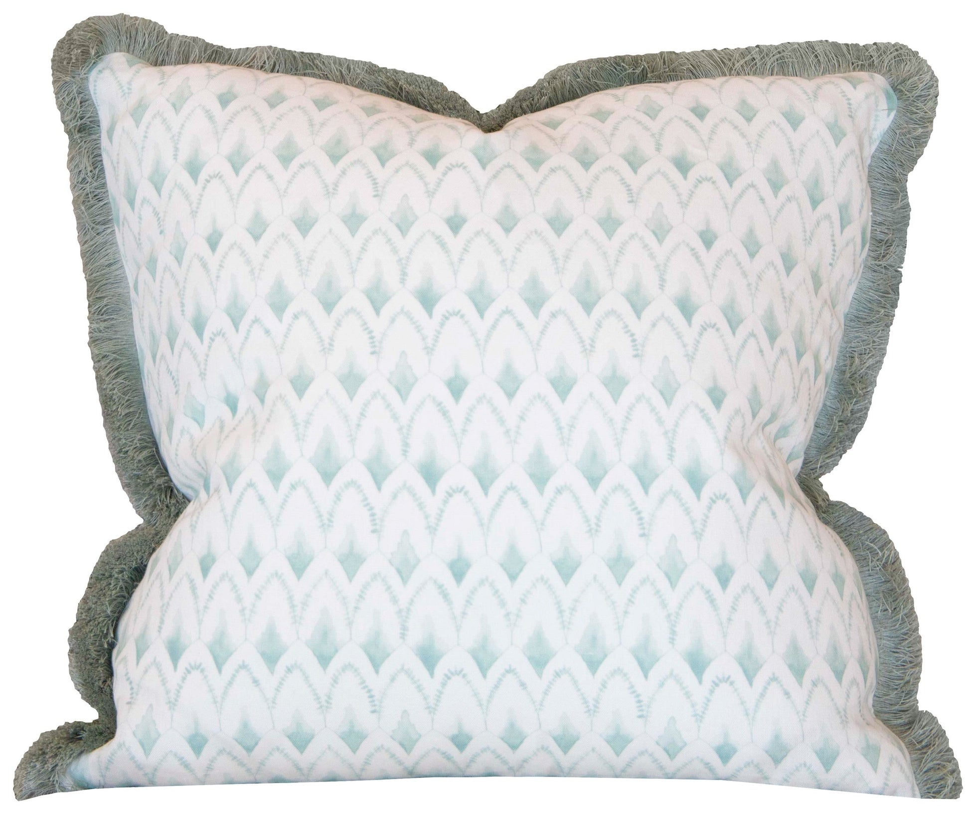 The Arrowhead Rainwashed Pillow is a custom-made square decorative pillow with a light blue and white geometric design, green fringe trim, and crafted from premium materials.