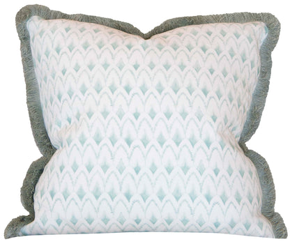 The Arrowhead Rainwashed Pillow is a custom-made square decorative pillow with a light blue and white geometric design, green fringe trim, and crafted from premium materials.