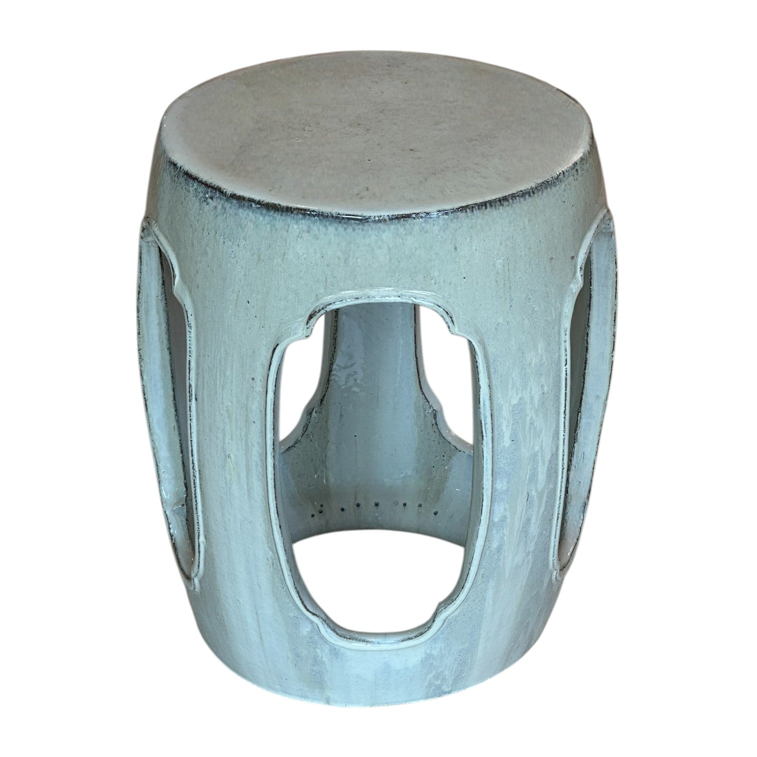 The Ming Style Garden Stool in White features a round, ceramic design with four large oval cutout openings, offering an elegant antique look inspired by traditional dragon kiln craftsmanship.