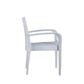 Side view of the Bari Stacking Arm Chair in Chambray, featuring light blue and white woven design, four straight legs, and curved armrests.