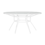 The Slant Outdoor Round Dining Table features a white metal frame, glass top, and four angled legs—weather-resistant for stylish garden gatherings.