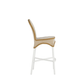 Side view of the Savoy Bar Stool, featuring a tan and white chevron woven seat and back, UV-resistant design for outdoor use, white legs, and a convenient footrest.