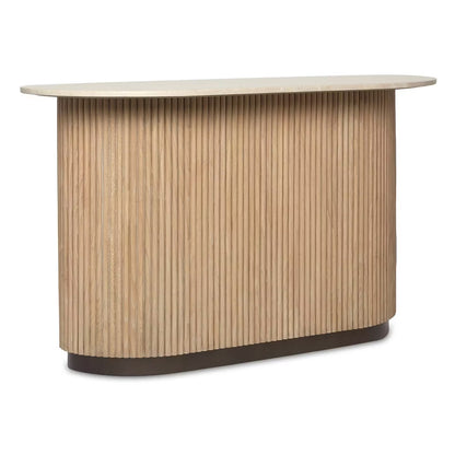 The Anton Bar showcases a wooden frame, fluted front panel, oval top, and rounded edges in a light natural finish for elegant style and smart storage.