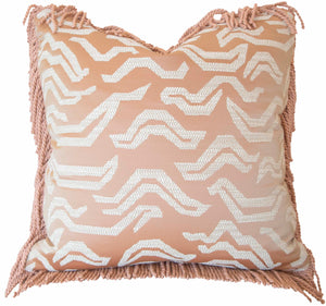 The Tigres Peche Pillow is a custom-made square throw pillow showcasing a pink and white zigzag pattern with fringed edges, crafted from premium materials.