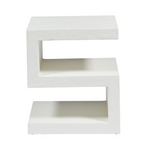 The S Side Table features a modern S-shaped design in a sleek white finish, with three flat surfaces and an open geometric style, photographed on a plain white background.