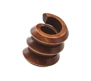 The Kim Seybert Brown & Gold Tendril Napkin Ring features a hand-carved, spiral-inspired design with interlocking elements, crafted from natural materials and displayed against a plain white background.